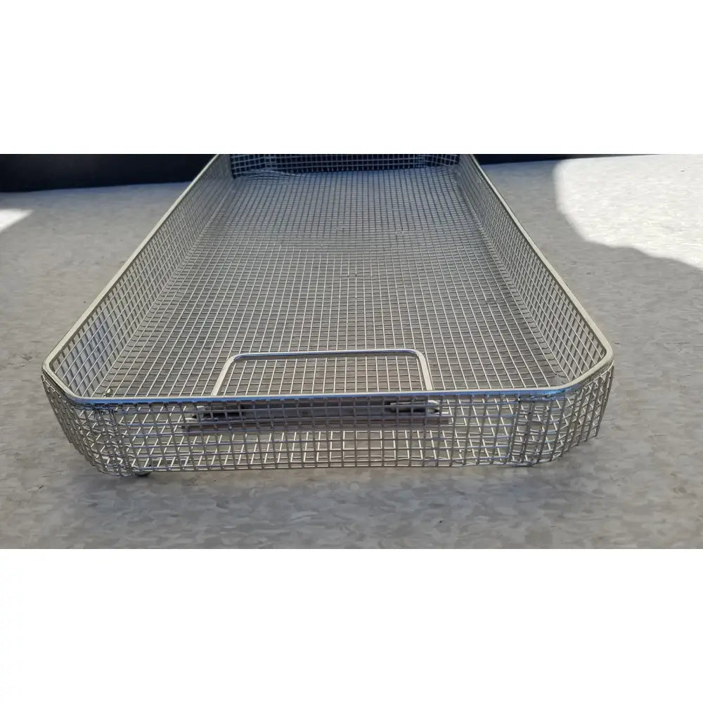 Rectangular stainless steel sterilization surgical cases basket with reinforced handle and sturdy grid pattern