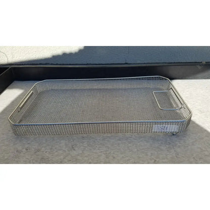 Rectangular stainless steel sterilization surgical cases basket with mesh tray, reinforced edges, and integrated handles