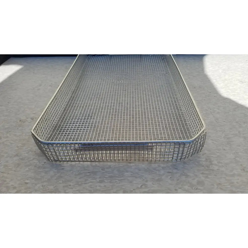 Rectangular stainless steel sterilization surgical cases basket with silver toned frame and uniform metal mesh design