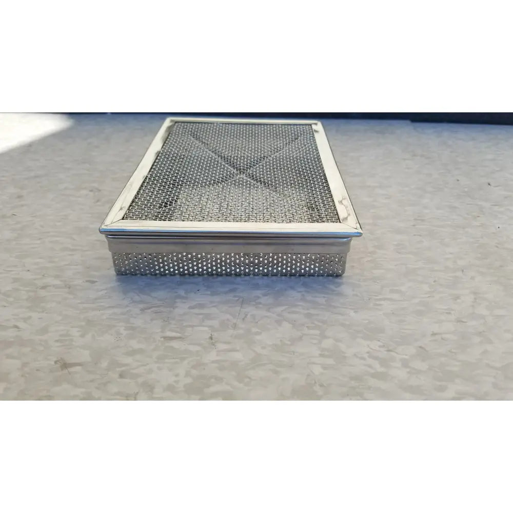 Rectangular stainless surgical instrument box mesh tray with raised border and perforated sides for sterilization