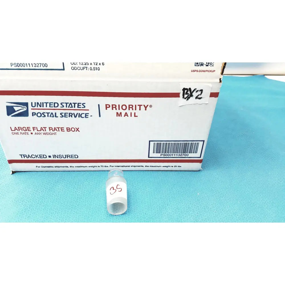 A clear plastic vial with a white label marked 35 features a standard taper no 29 borosilicate glass hollow stopper