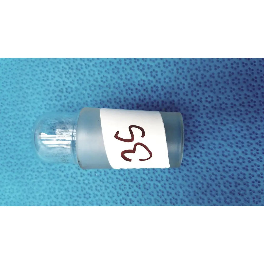 Clear glass vial with frosted body and labeled white sticker featuring handwritten number 35 standard taper ground glass hollow stopper