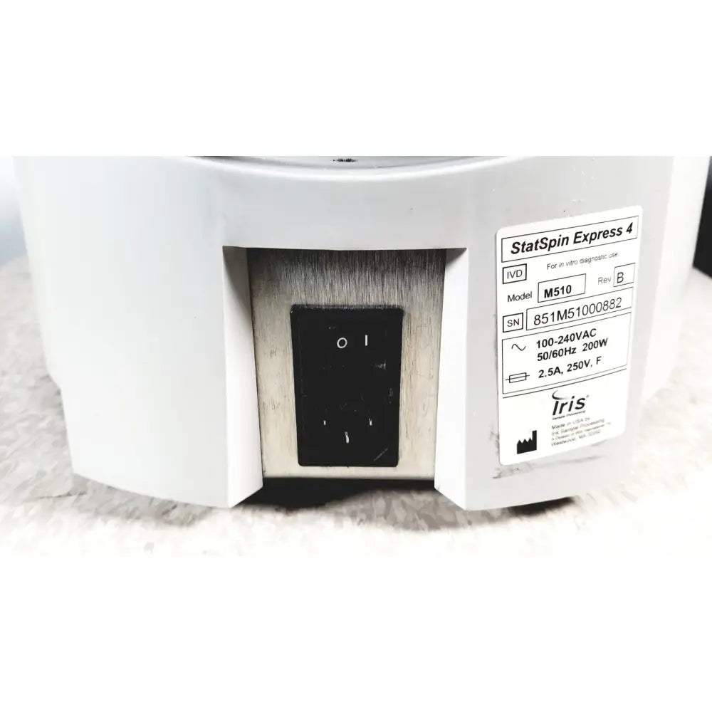 White plastic and stainless steel statspin express 4 m510 high-speed horizontal centrifuge with black power switch