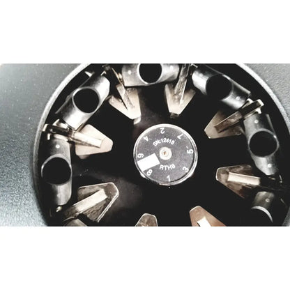 Black metal rotor with numbered slots and serial number sk12418 of statspin express m510 high-speed horizontal centrifuge