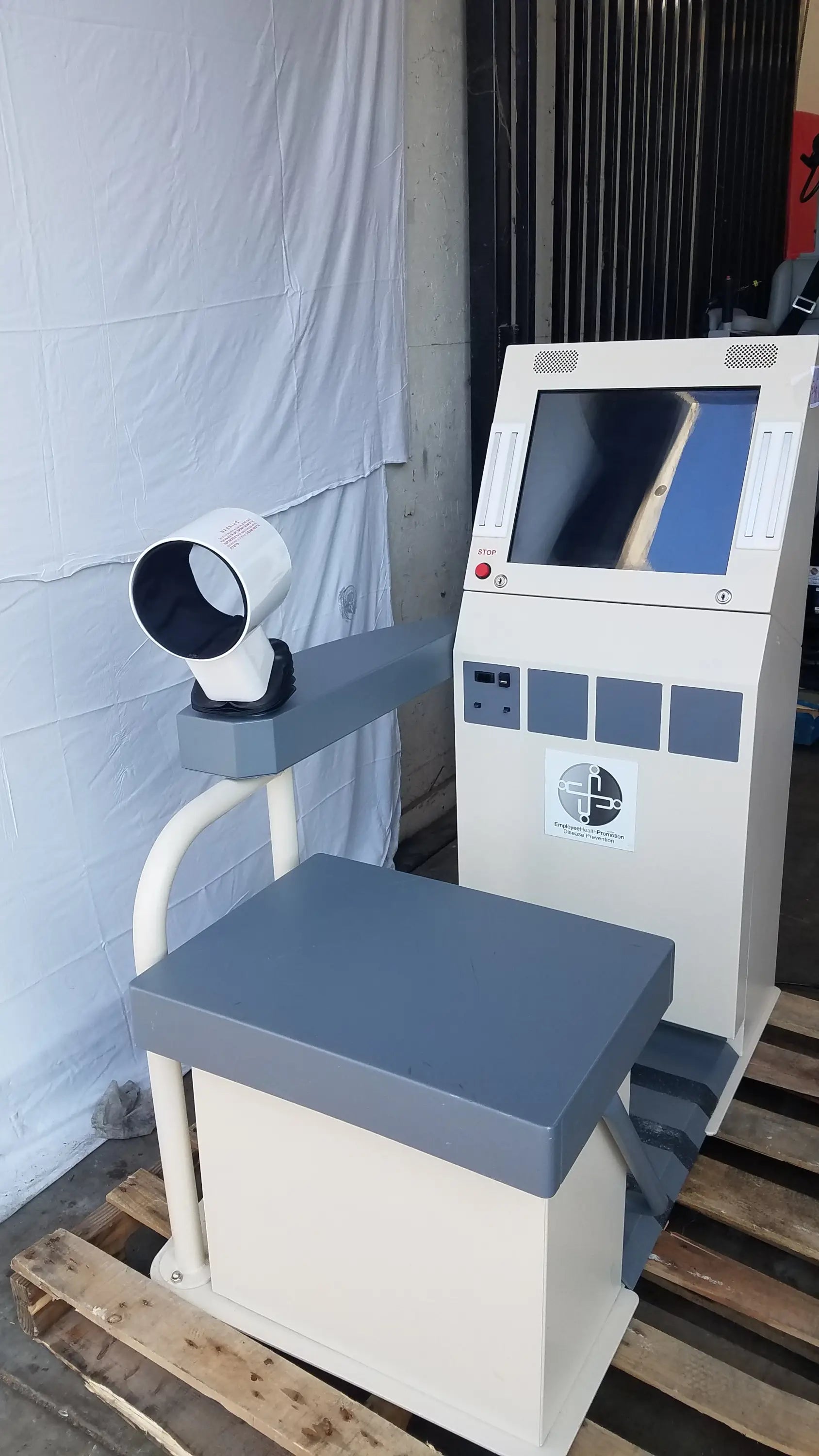Beige and gray stayhealthy sh650 health screening kiosk with touchscreen display control panel and mounted scanner