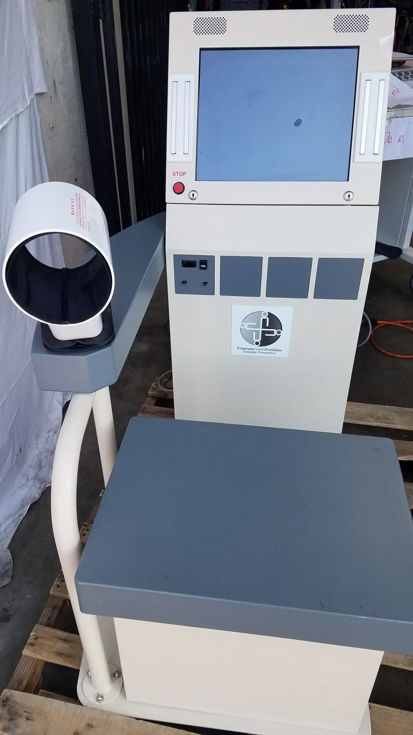 Beige and gray stayhealthy sh650 self-service health screening kiosk with touchscreen display and cylindrical scanner for screening