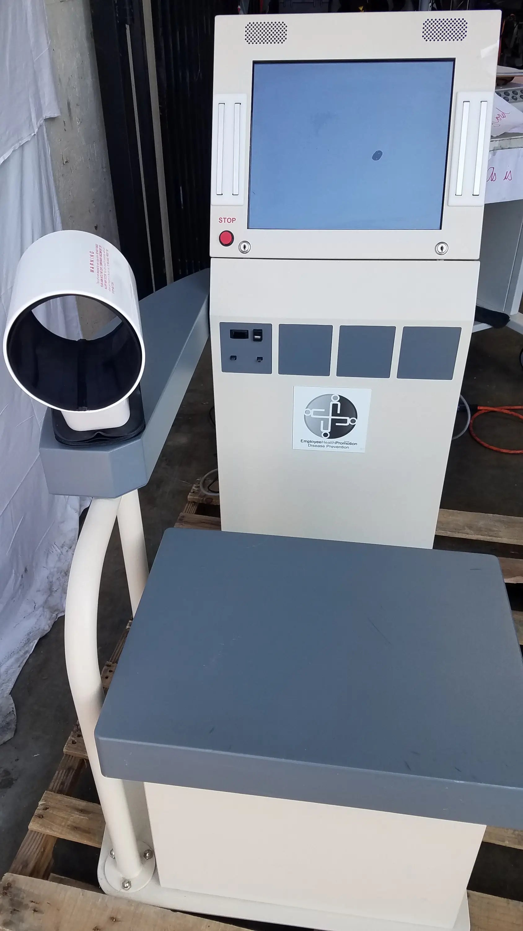 Beige and gray stayhealthy sh650 self-service health screening kiosk with touchscreen display and cylindrical scanner for screening