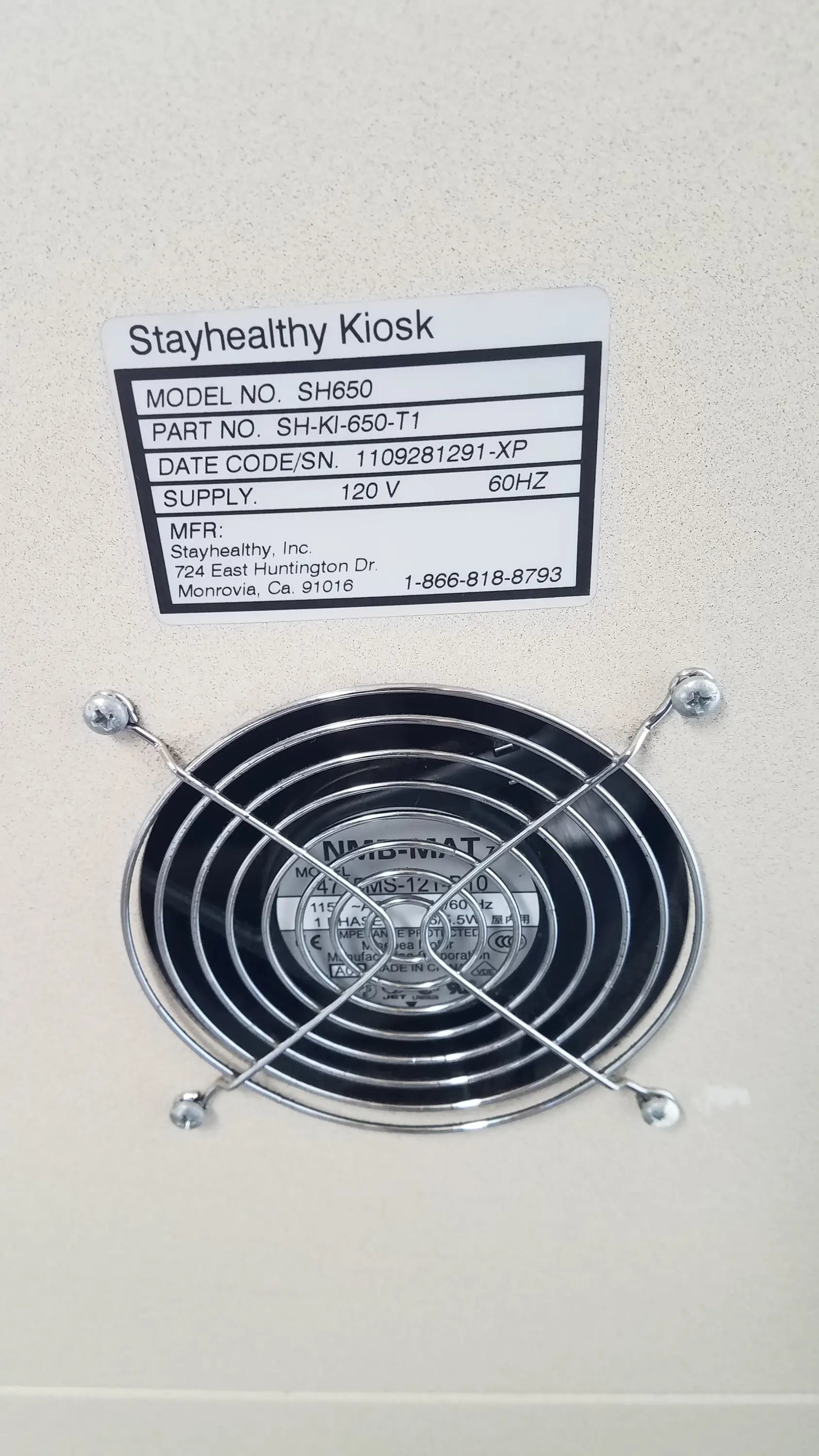 Black and silver circular fan with metal grille on the back side of stayhealthy sh650 health screening kiosk