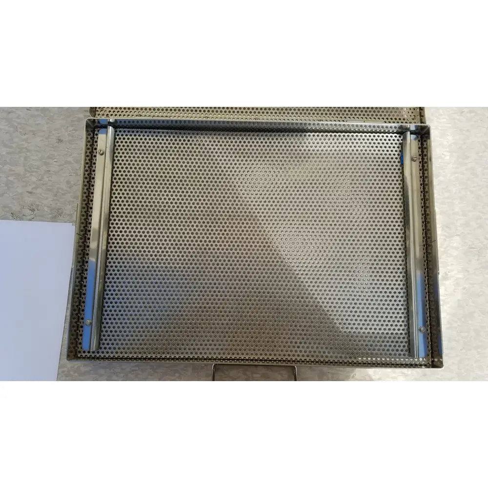 Rectangular metal sterilization case tray with perforated surface and reinforced edges for surgical instruments