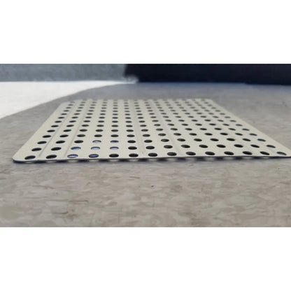 Silver perforated metal sterilization container inserts f170 with evenly spaced circular holes for secure ventilation