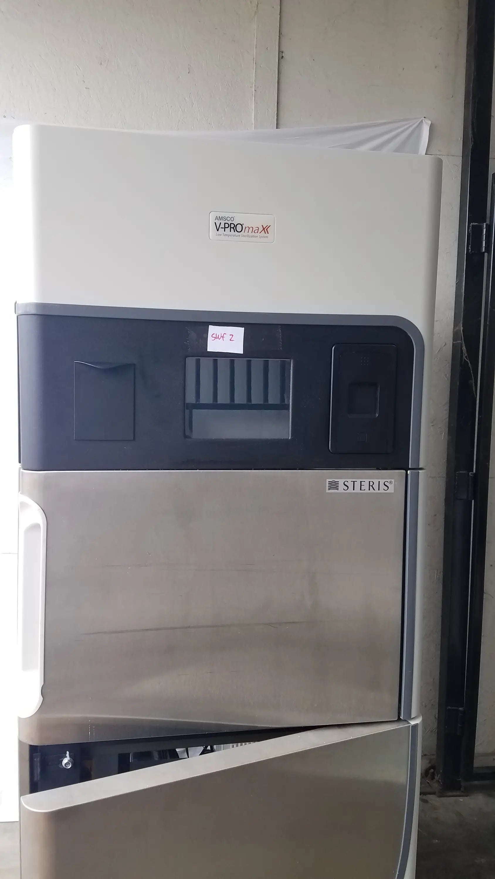 Steris v-pro max low temperature sterilization system with stainless steel front panel and black upper section serial 0324513-13