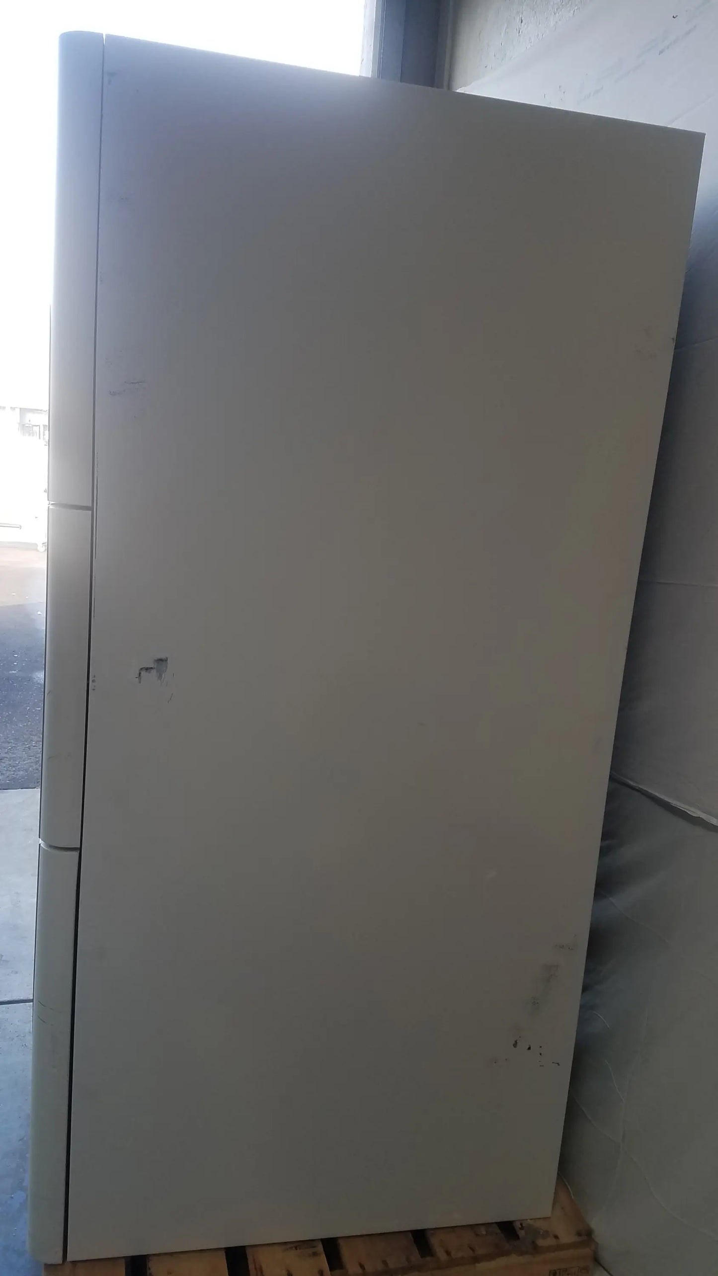 Steris V-Pro Max low temperature sterilization system with tall off-white metal cabinet and keyhole on left side