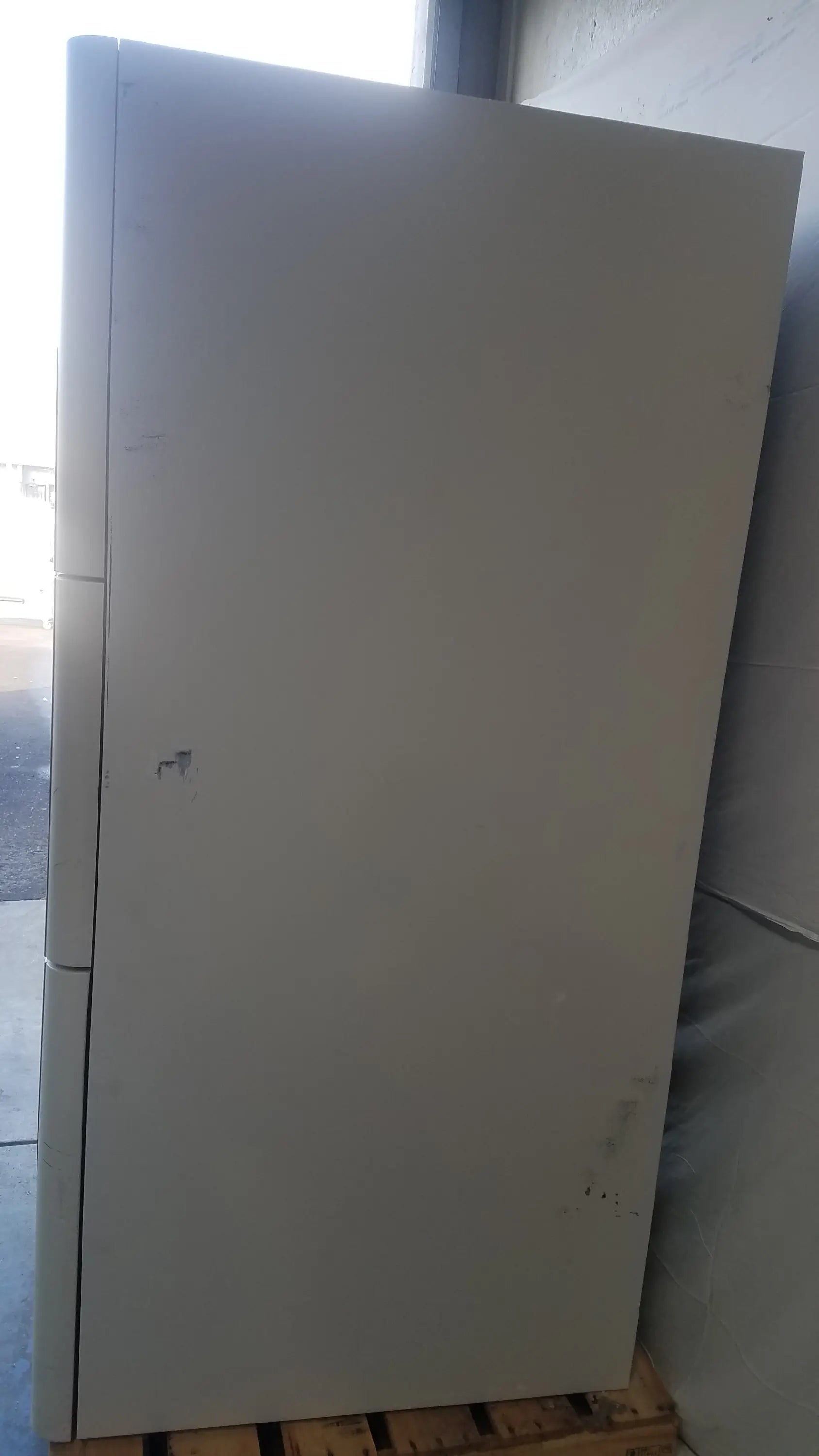 Steris V-Pro Max low temperature sterilization system with tall off-white metal cabinet and keyhole on left side