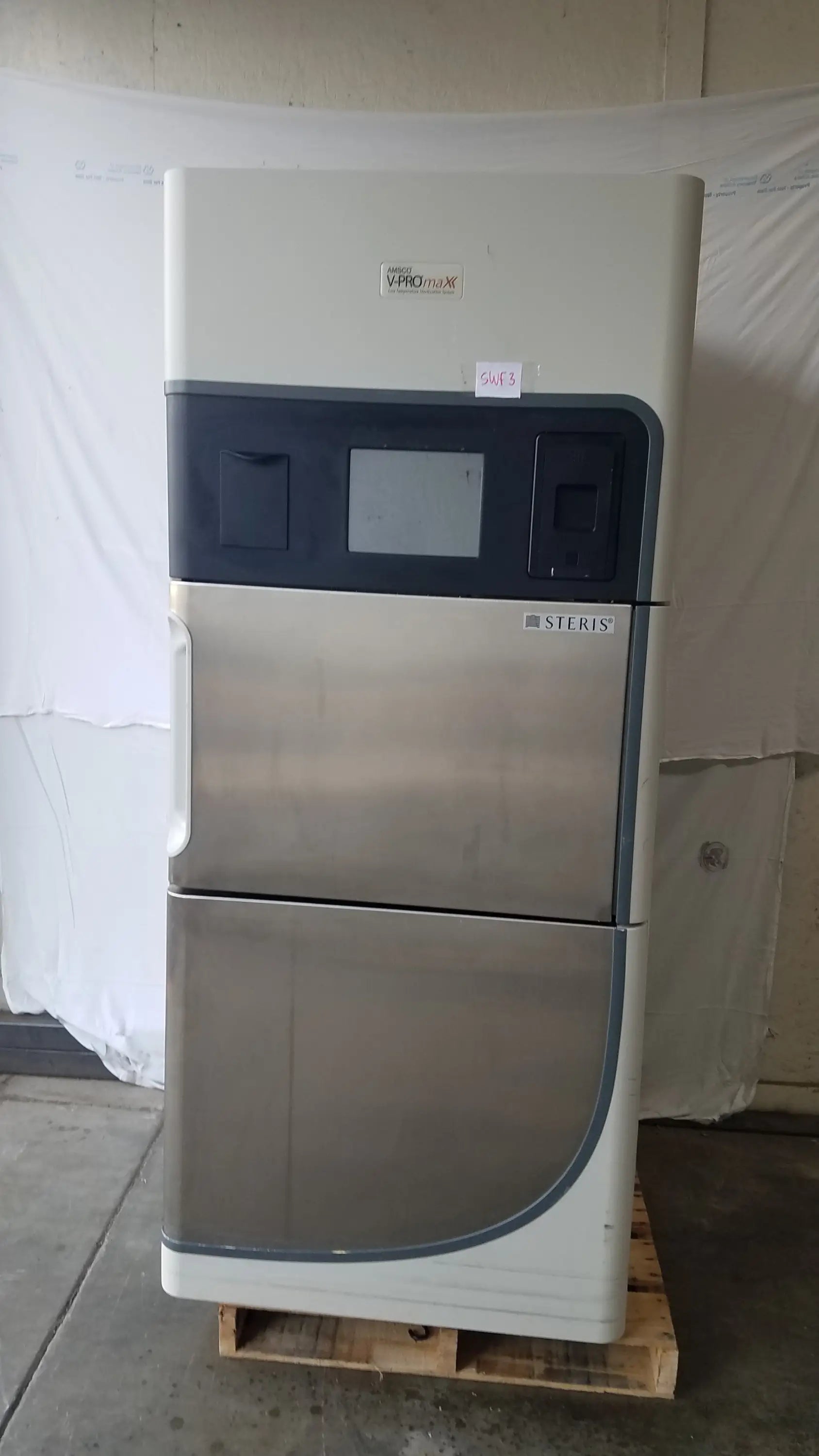 Steris v-pro max low temperature sterilization system in beige and stainless steel with digital display and control panel