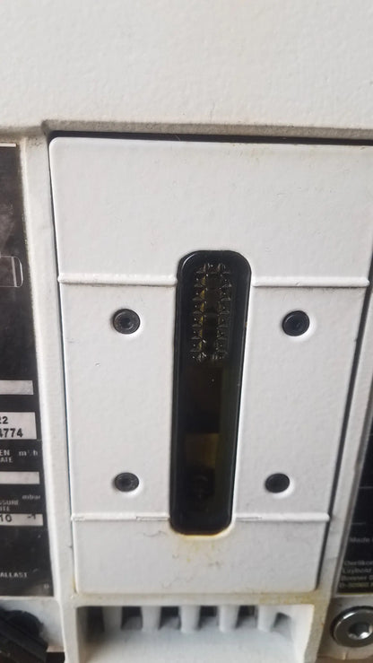 White plastic electrical circuit breaker with black handle embossed text for steris v-pro max low temperature sterilization system