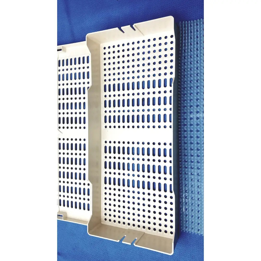 White plastic sterrad nx standard sterilization container tray with grid of circular and elongated perforations