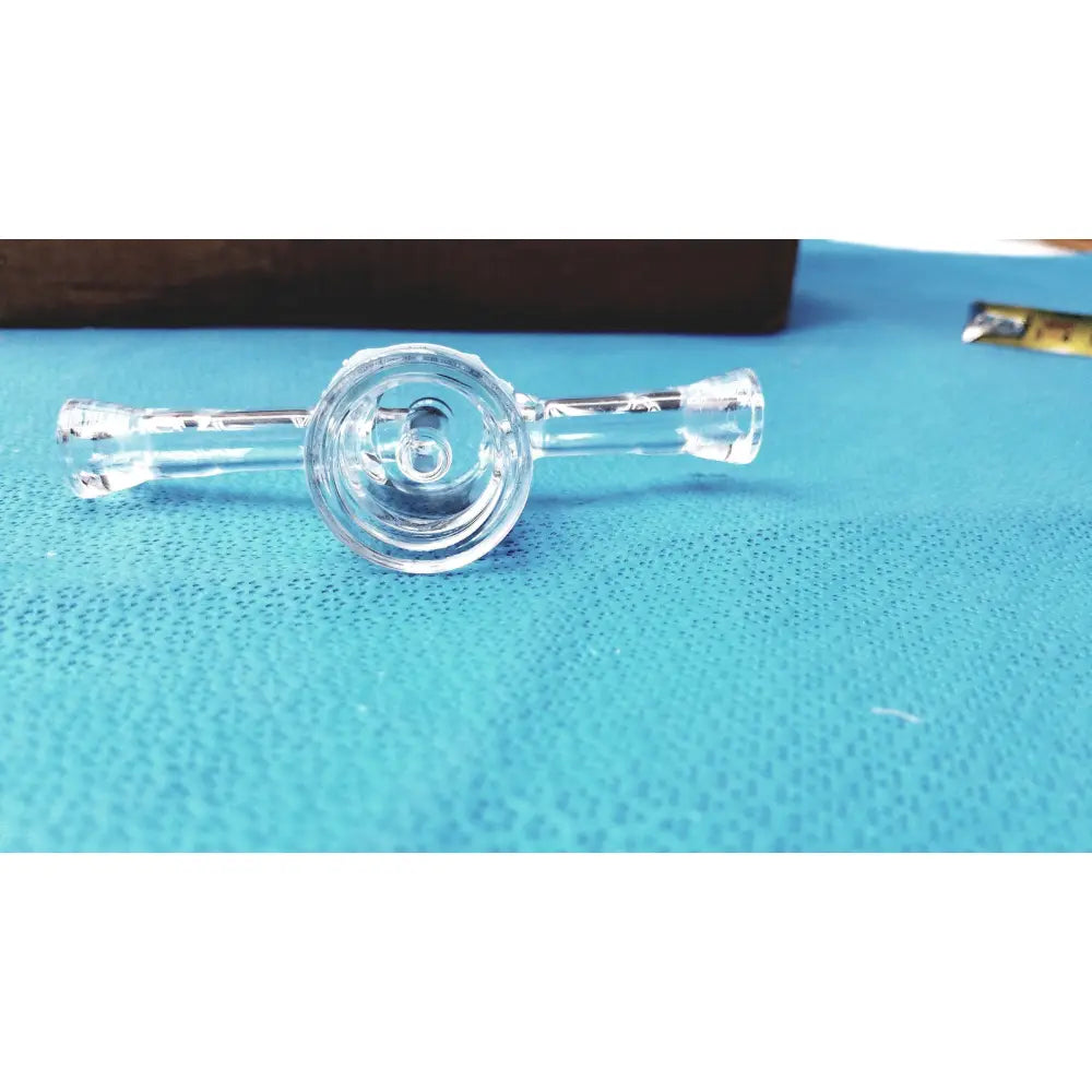 Clear glass bong with circular bowl and tapered arms featuring a borosilicate glass lab stopcock joint connector with valve