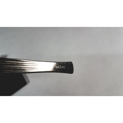Silver-toned metal storz cottle nasal knife instrument with ribbed grip and engraved n4240 marking on handle