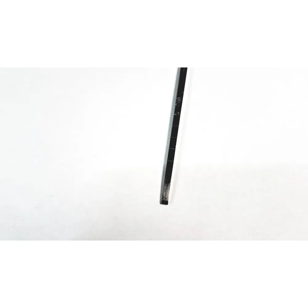Black metal ruler with engraved markings and a worn edge for storz cottle nasal 4mm blade surgical knife use