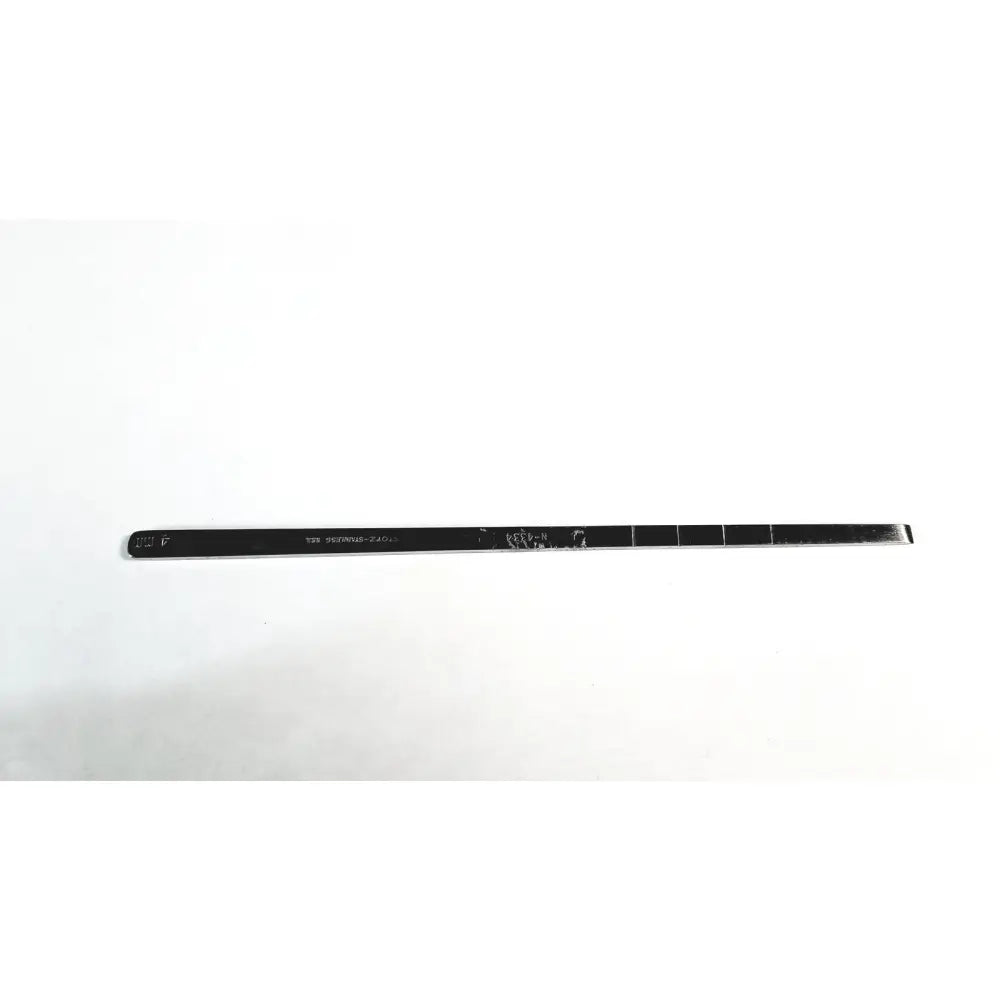 Black metal ruler with engraved markings and worn surface for measuring storz cottle nasal knife 4mm blade surgical use