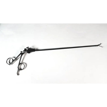 Black storz laparoscopy forceps with articulated handles and fine-tipped jaws made of stainless steel surgical instrument