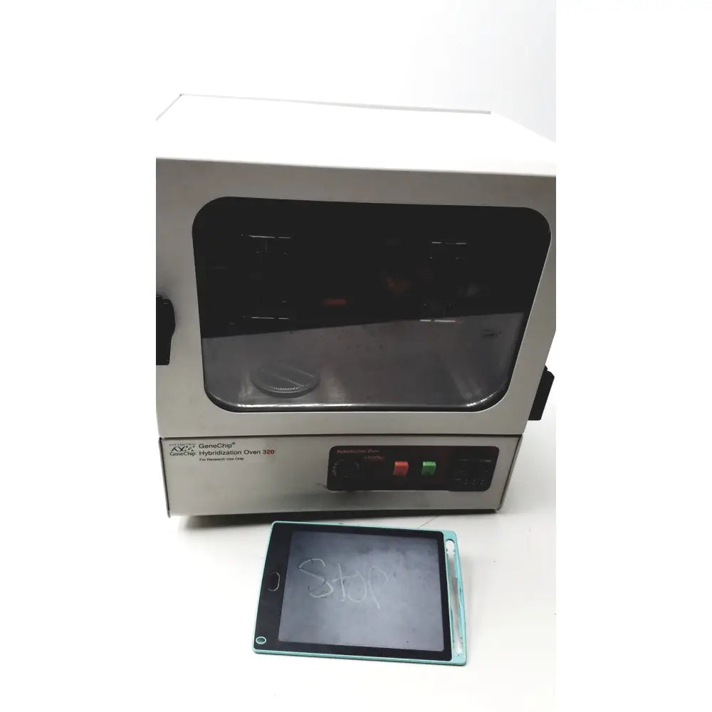 Silver stainless steel stovall affymetrix gene chip 320 hybridization oven model h010115 with black glass door and control panel