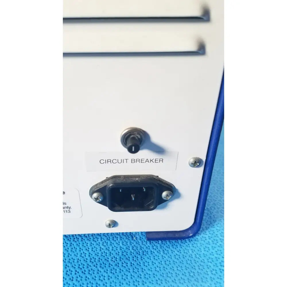 White stratagene stratalinker UV 1800 crosslinker with black power plug and silver circuit breaker switch for reuse medical purposes