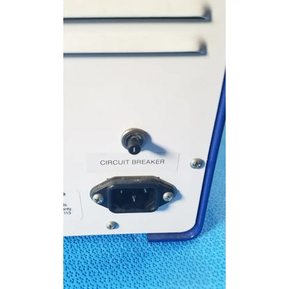 White stratagene stratalinker UV 1800 crosslinker with black power plug and silver circuit breaker switch for reuse medical purposes