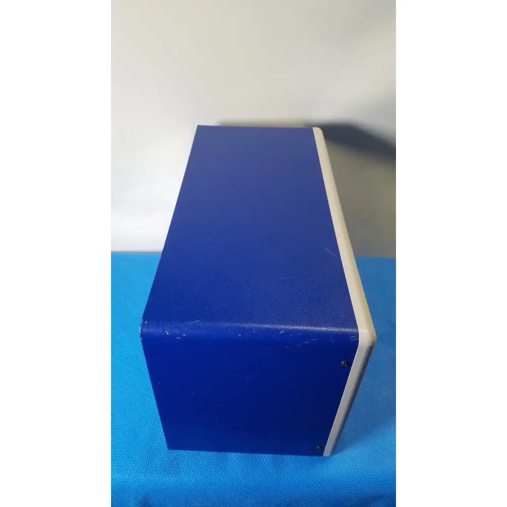Blue rectangular stratagene stratalinker UV 1800 crosslinker box with white trim designed for reuse medical applications