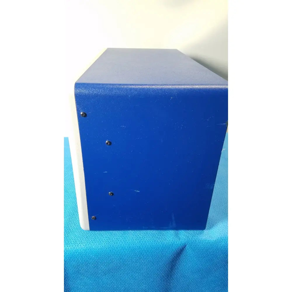 Blue and white matte rectangular stratagene stratalinker uv 1800 crosslinker secured by four black screws for reuse medical