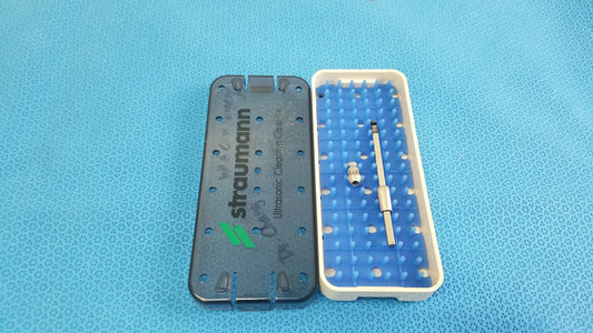 Gray and blue plastic ultrasonic cleaning cassette with metallic probe for medical equipment reuse and ultrasonic cleaning