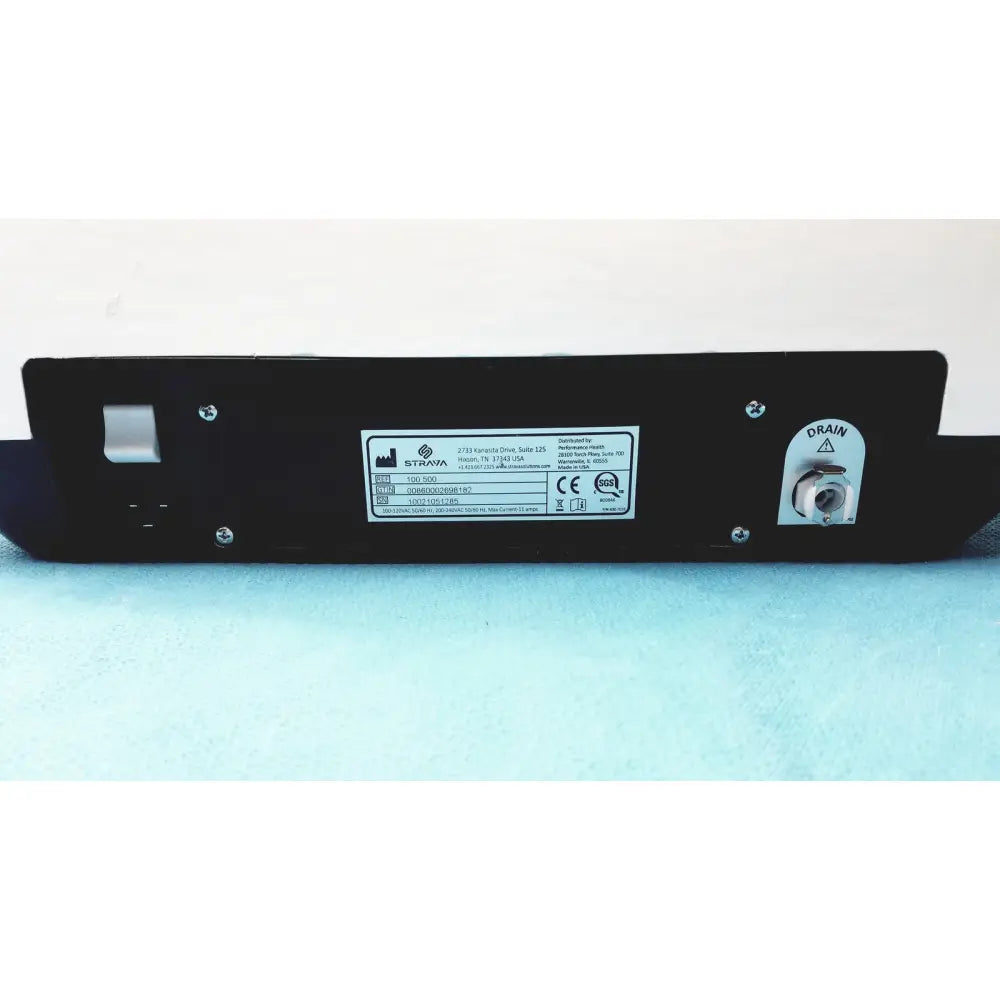 Black rectangular strava splint bath water heater base with silver drain valve and specification label for straya ref 100.500