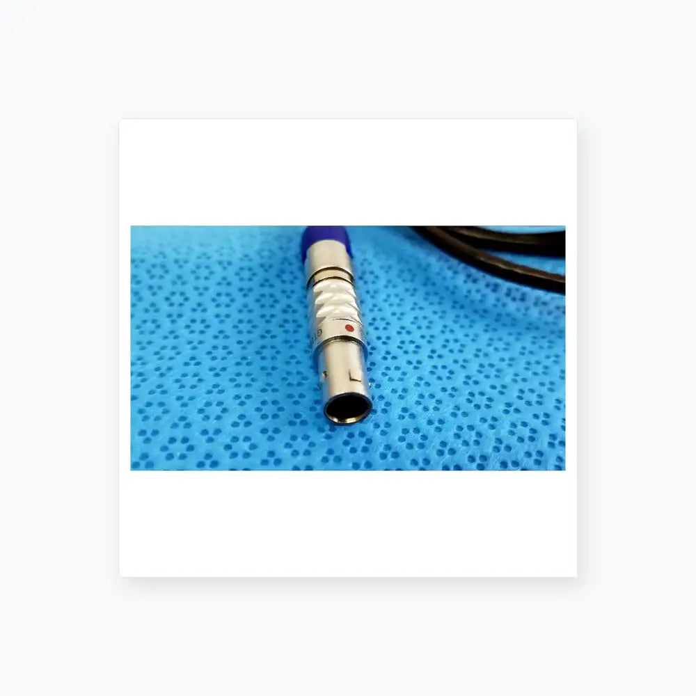 Silver medical-grade connector with blue cap and red dot on stryker multiGen 2 lightweight sterilization box for reuse medical equipment