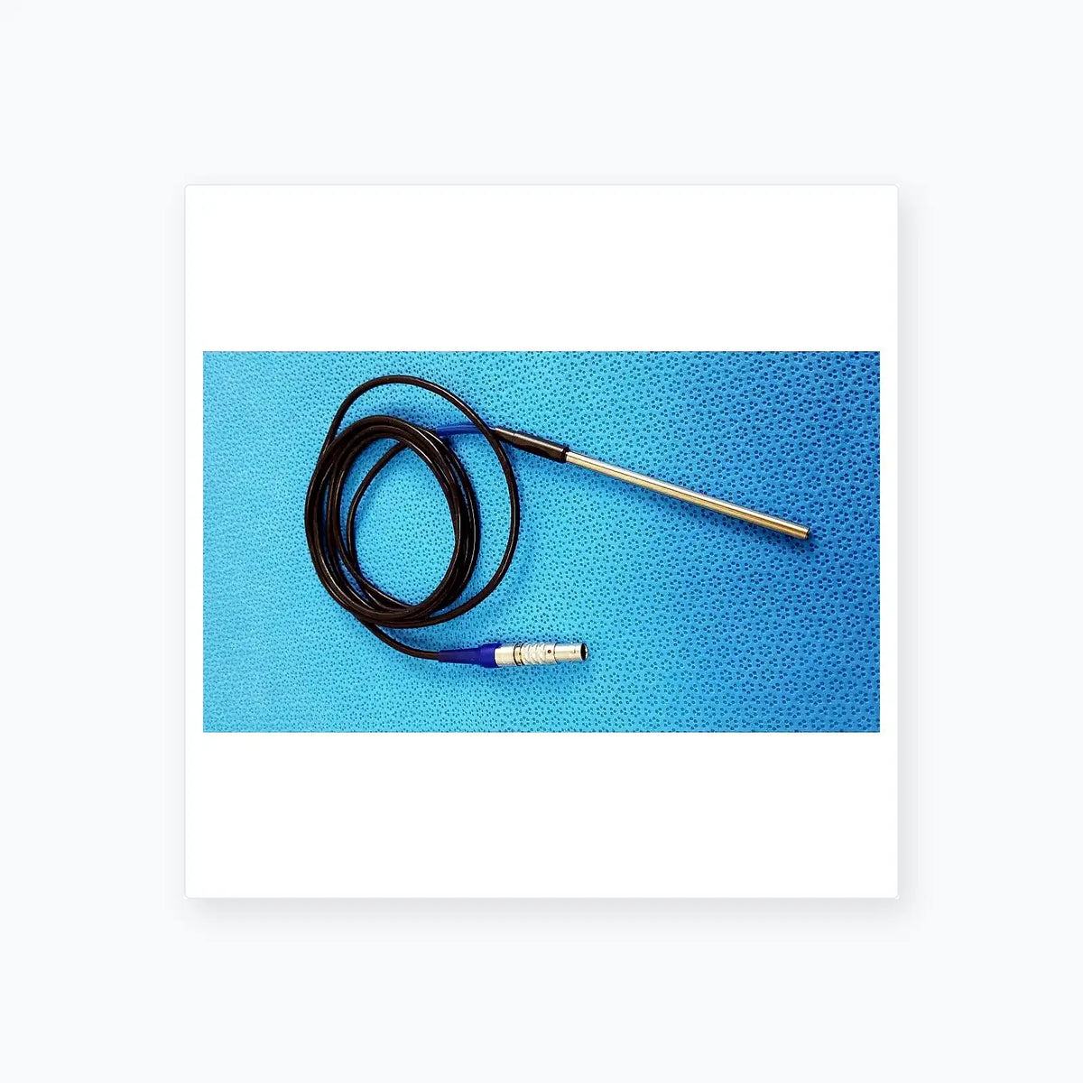 Black coiled cable with metallic probe and blue connector for stryker multiGen 2 lightweight sterilization box medical equipment