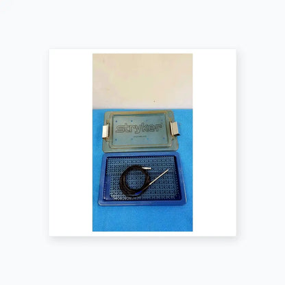 Blue stryker 0406-650-400 sterilization box with black coiled cable and metallic electrode probe for reuse medical equipment