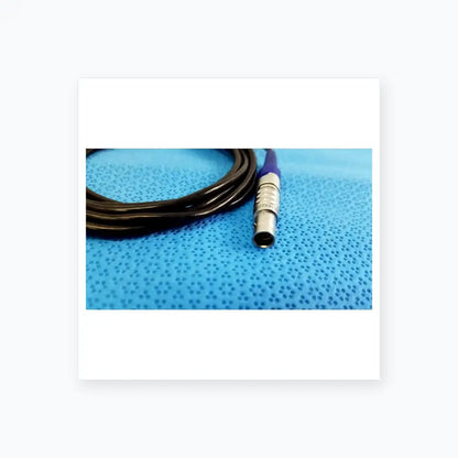 Black coiled cable with silver and purple connector for stryker 0406-650-400 multigen 2 sterilization box medical equipment