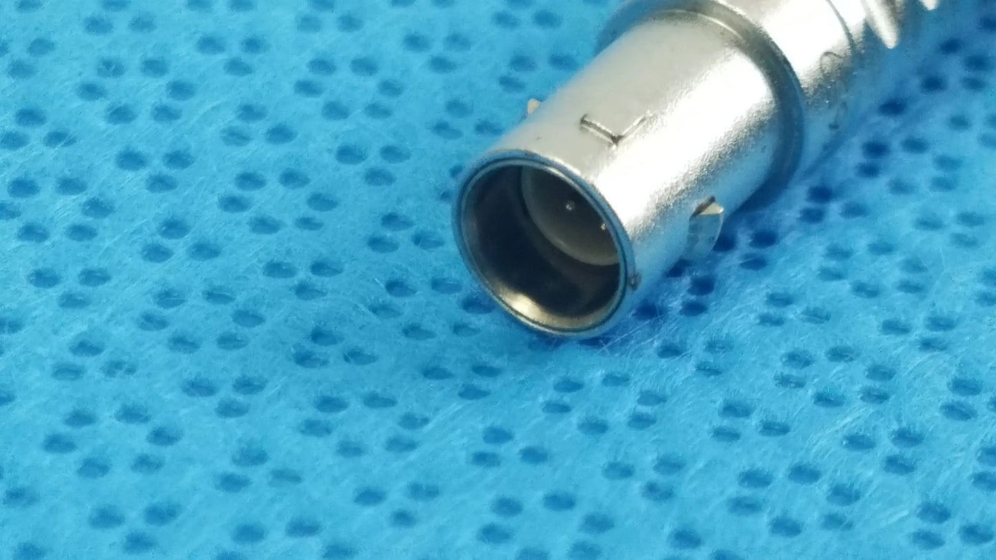 Silver-colored metal bnc connector with threaded body and central pin on back side of stryker 0406-650-400 medical equipment reuse medical equipment