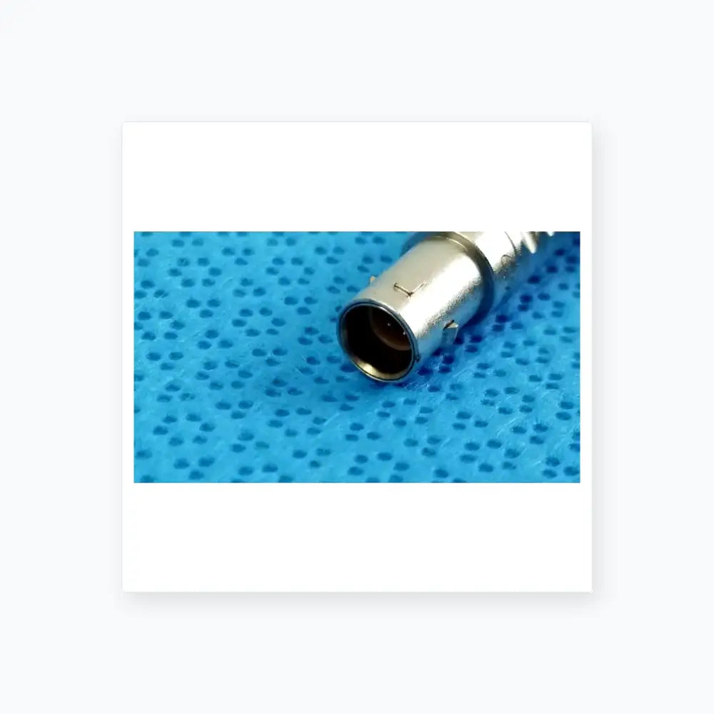 Silver-colored metal bnc connector with threaded body and central pin on back side of stryker 0406-650-400 medical equipment reuse medical equipment