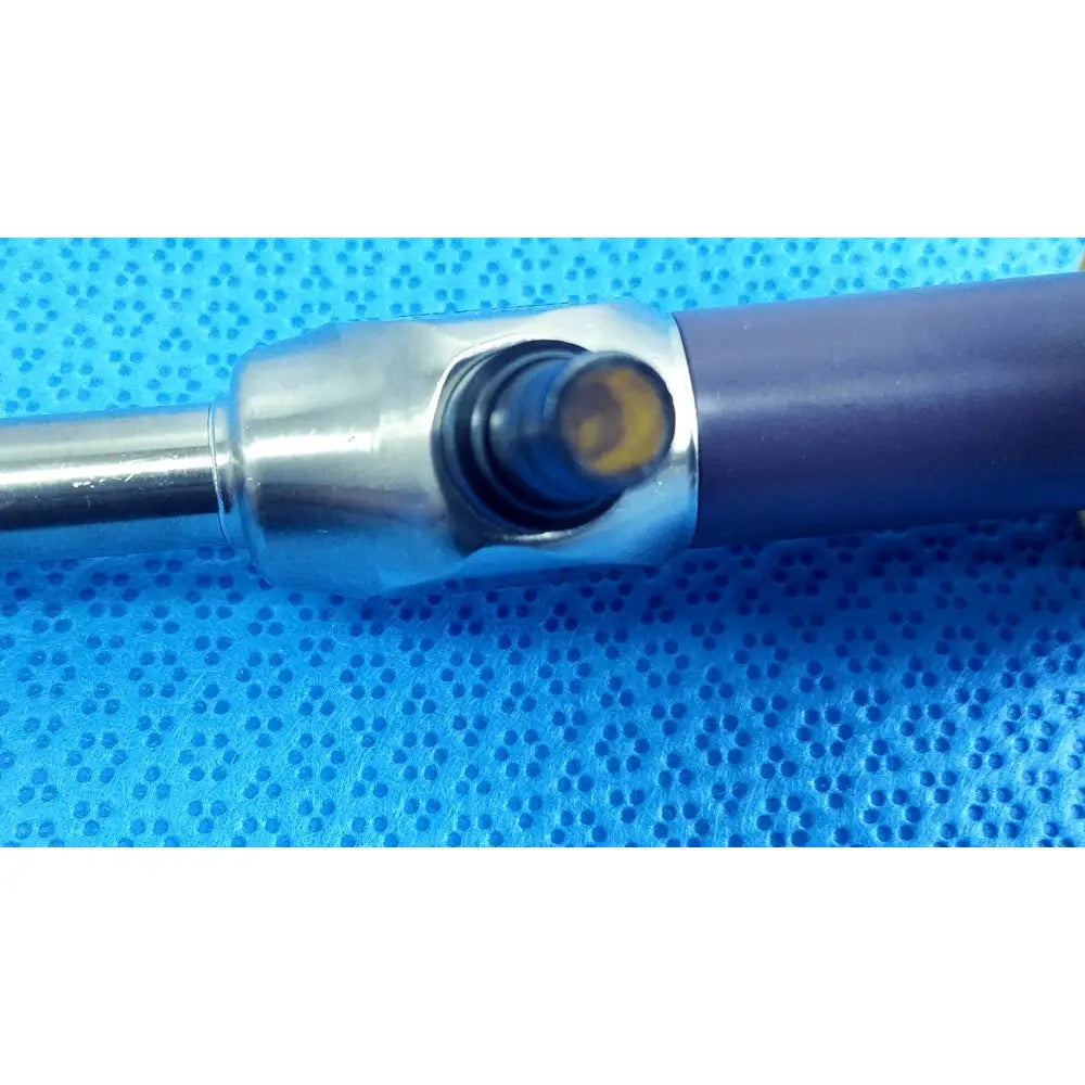 Stryker purple-handled precision 10mm 0° autoclavable endoscope with metallic joint and yellow-tinted tip