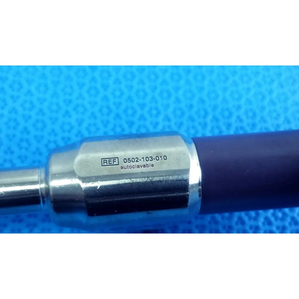 Silver metallic stryker precision 10mm 0° autoclavable endoscope with dark blue handle and engraved reference number