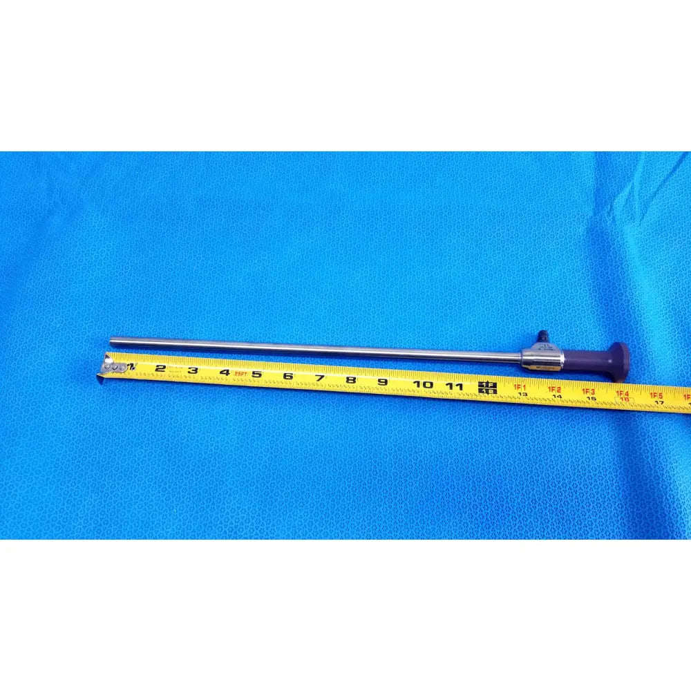 Silver stryker precision 10mm 0° autoclavable endoscope with purple handle and metallic joints on blue surface