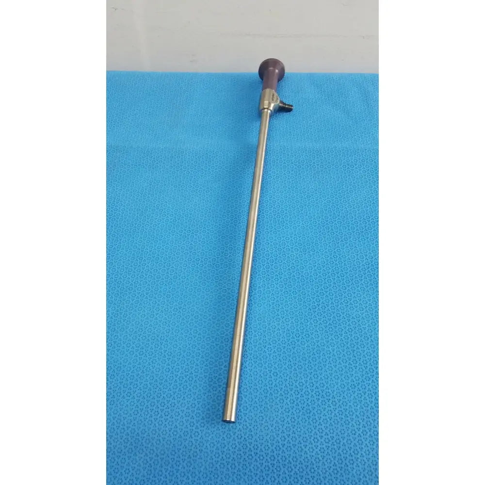 A metallic stryker precision 10mm 0° autoclavable endoscope with a purple-tipped handle and slender reflective shaft