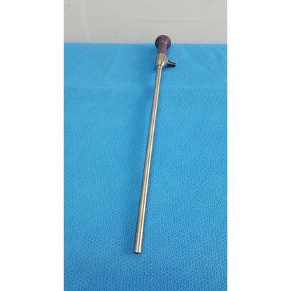 A metallic stryker precision 10mm 0° autoclavable endoscope with a purple-tipped handle and slender reflective shaft