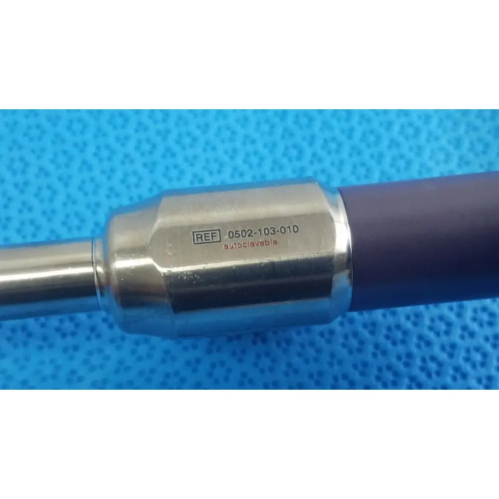 Silver metallic stryker precision 10mm 0° autoclavable endoscope with dark purple handle and engraved reference number