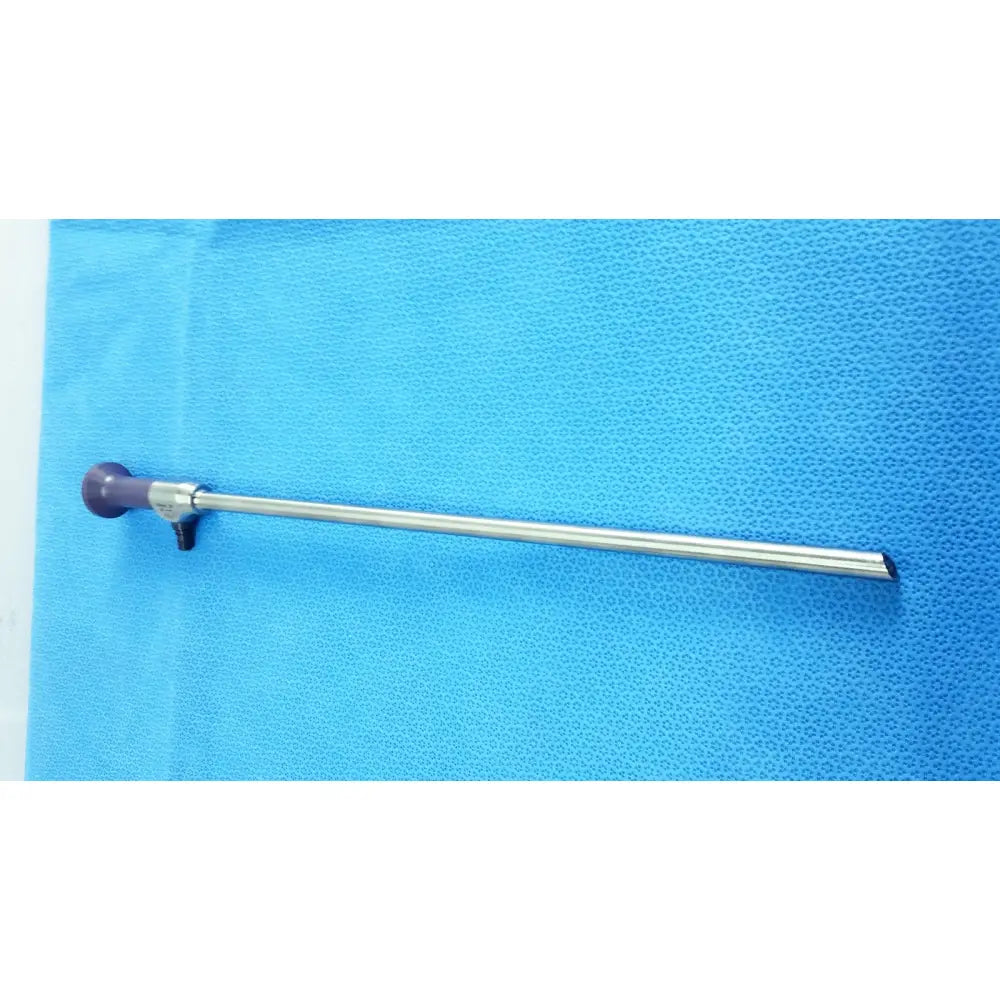 Silver precision 10mm 30° autoclavable endoscope with purple handle and black tip on blue textured surface