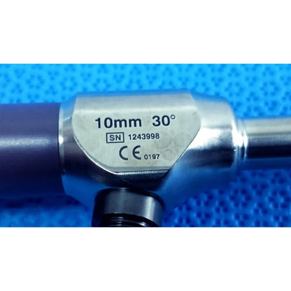 Silver precision 10mm 30° autoclavable Stryker endoscope with angled tip and engraved serial number visible