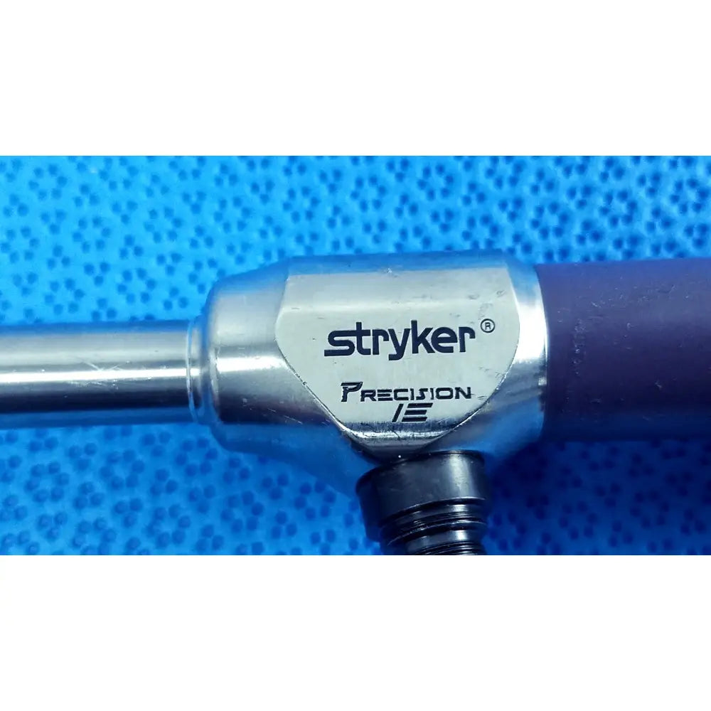 Stryker precision 10mm 30° autoclavable endoscope with metallic silver body and black grip for surgical use