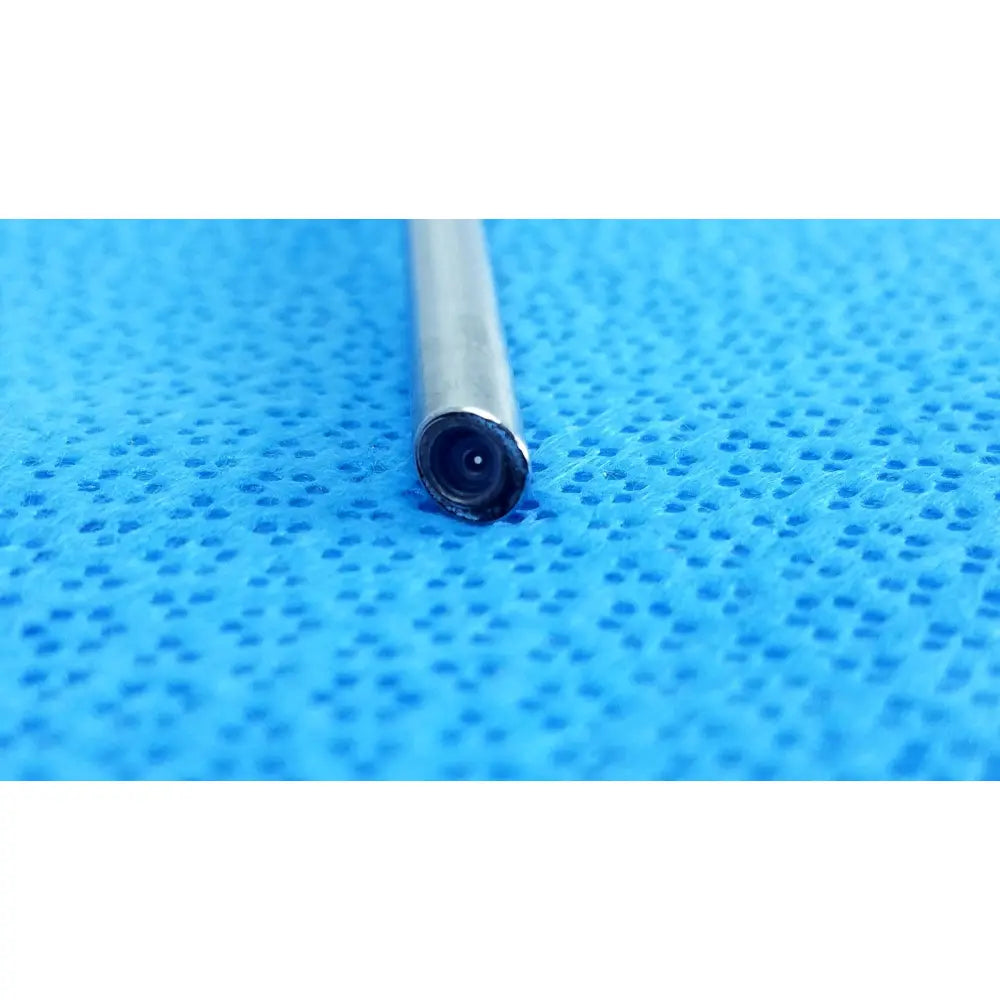Silver cylindrical stryker 0502-503-030 5mm 0° autoclavable endoscope with black lens on blue textured surface