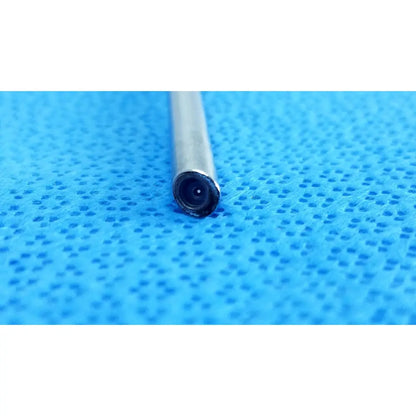 Silver cylindrical stryker 0502-503-030 5mm 0° autoclavable endoscope with black lens on blue textured surface