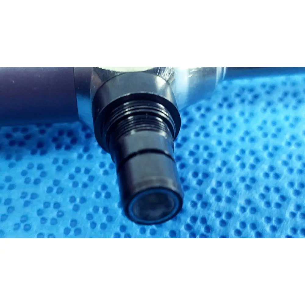 Black threaded connector with metallic finish on blue surface of stryker 5.5mm 0° autoclavable endoscope for reuse medical